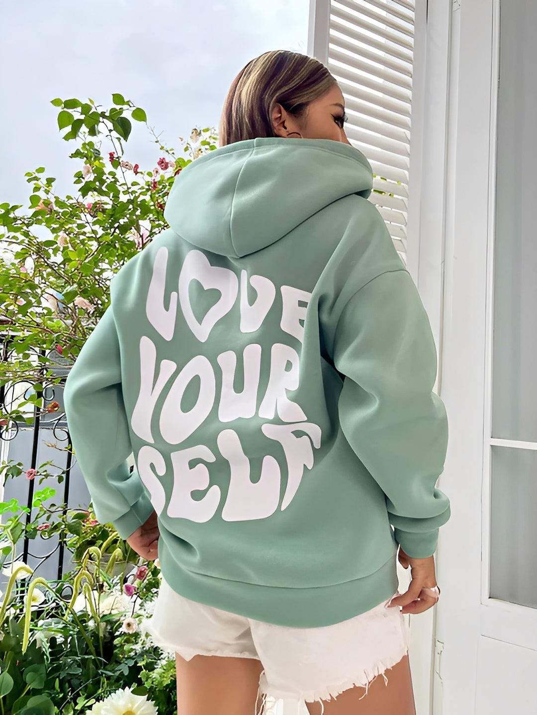 Marian - Fashionable Hoodie with Statement Design for Women